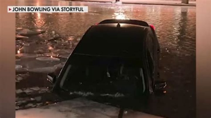 
WATCH: Viral video shows alleged drunk driver cruising through a frozen canal in Indianapolis 
