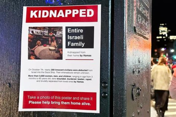 
Who is Kinza Khan? Chicago Attorney filmed tearing down posters of kidnapped Israeli children 